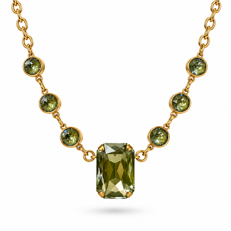 Herbal Green crystal necklace with a rectangular center crystal and three round crystals on each side, on a white background